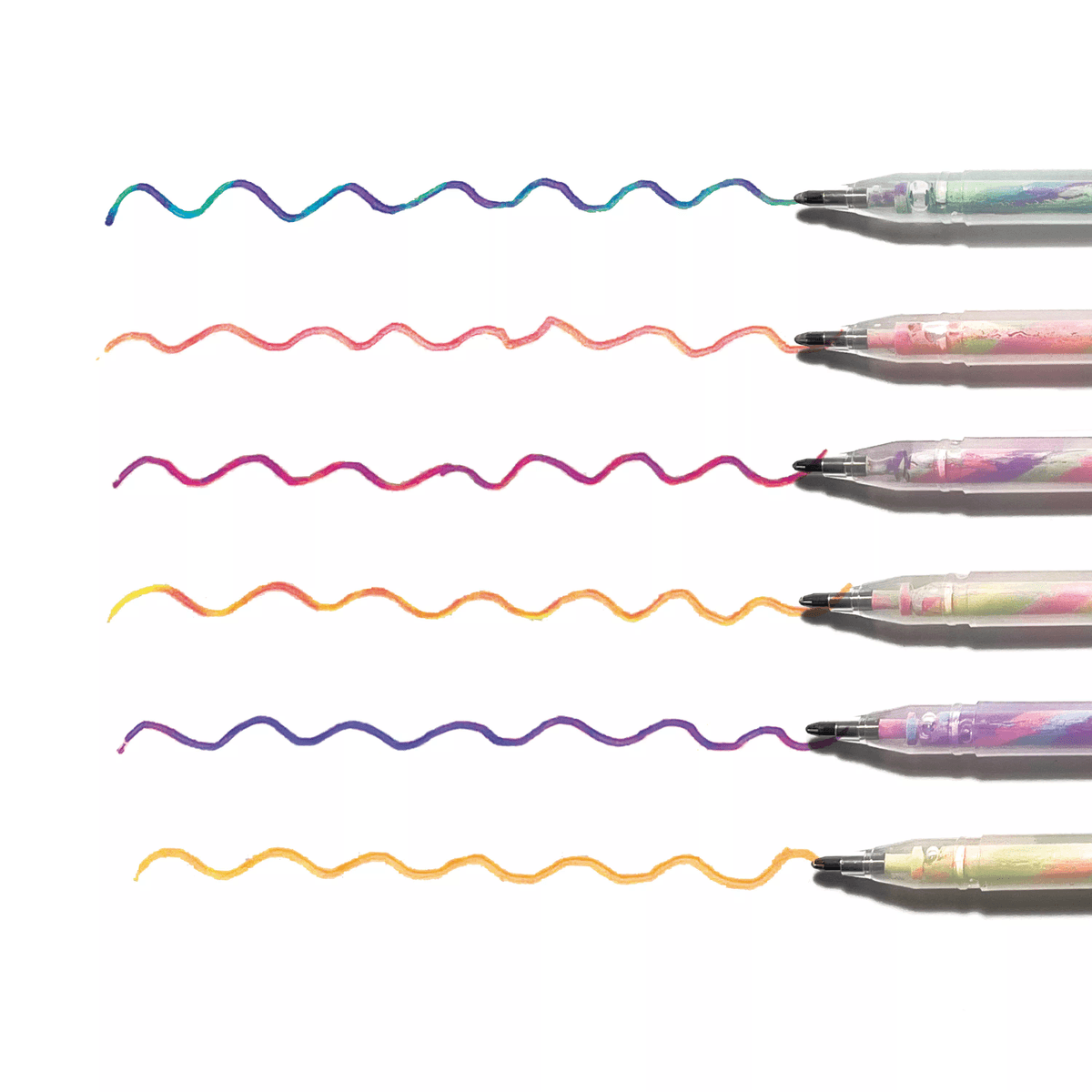 Image of Tutti Fruitti Gel Pens on white paper next to colorful swatches