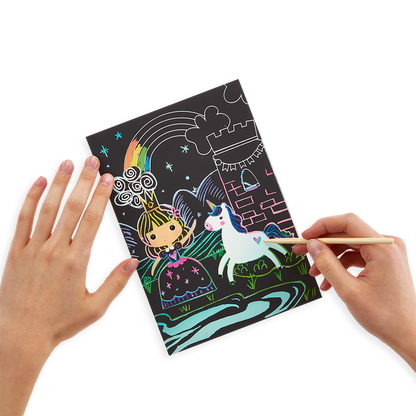 Girl using Princess Garden Scratch and Scribble scratch art kit