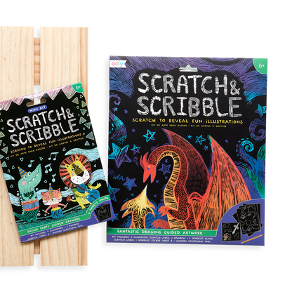 Display image of the OOLY Safari Party Scratch and Scribble Mini Scratch Art Kit next to the original Fantastic Dragons Scratch and Scribble. 