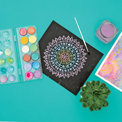 Mandala design on black paper painted with OOLY Chroma Blends pearlescent watercolor paints