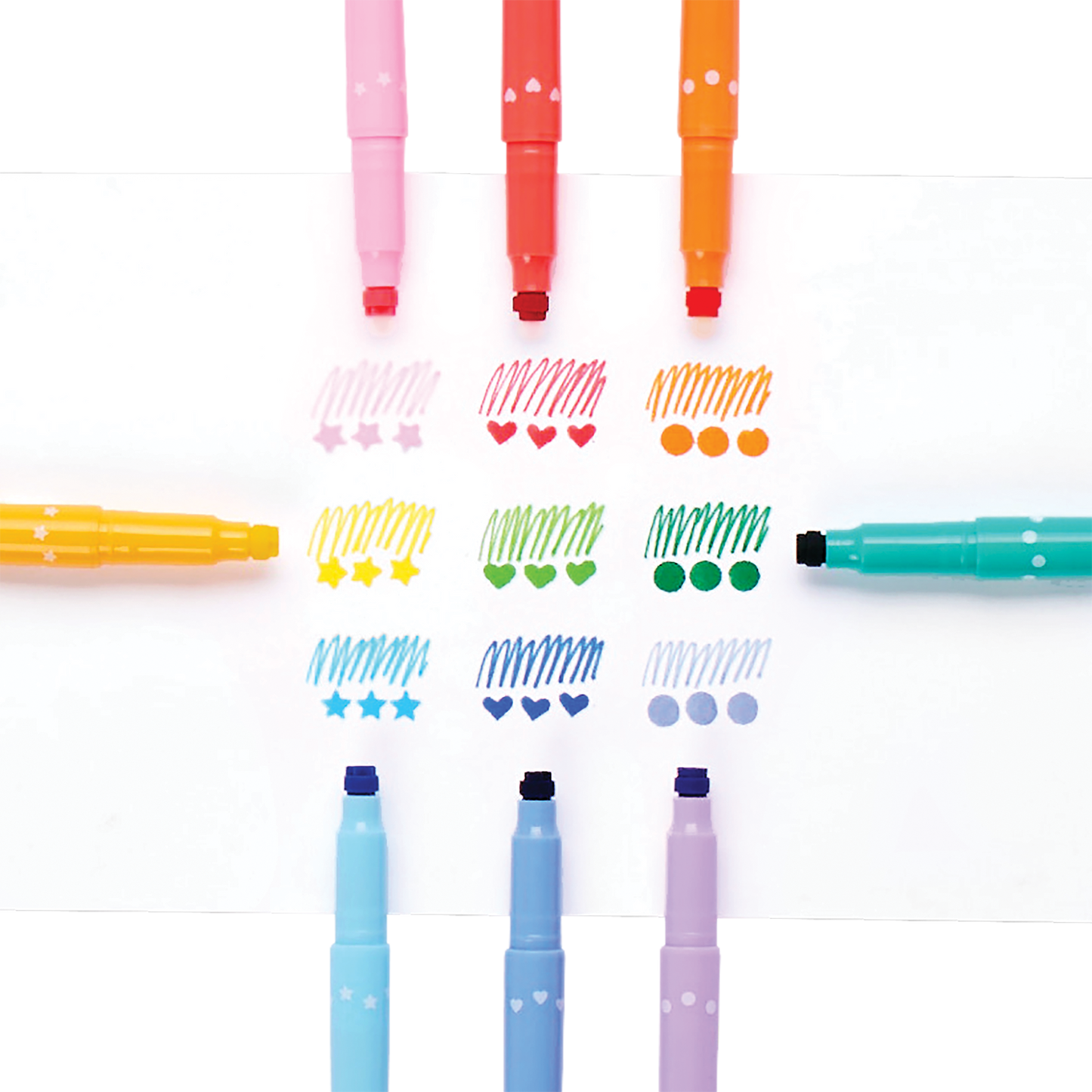 Colored swatches of scribbles and stamps from OOLY Confetti Stamp Double-Ended Markers