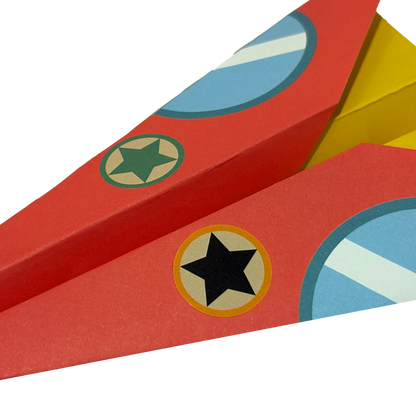 Completed paper airplane from OOLY DIY Paper Airplanes Activity Kit