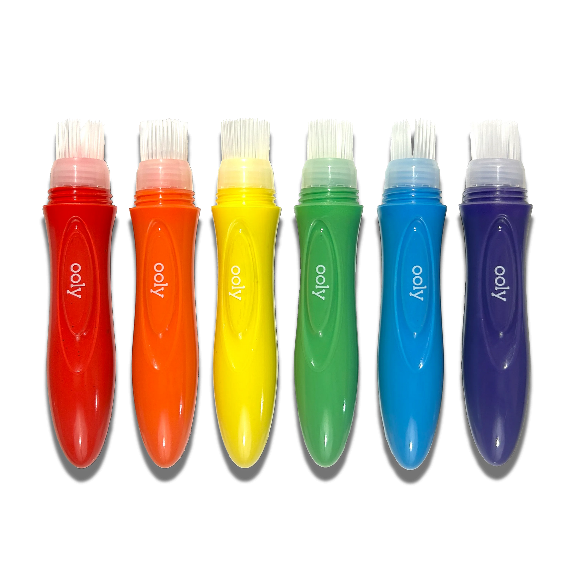 Row of uncapped paint brushes from OOLY Easy Squeezy Squeezable Poster Paint Brushes