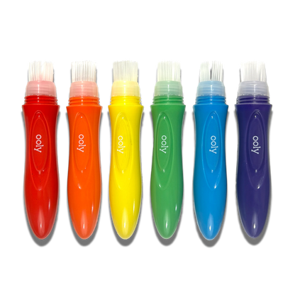 Row of uncapped paint brushes from OOLY Easy Squeezy Squeezable Poster Paint Brushes
