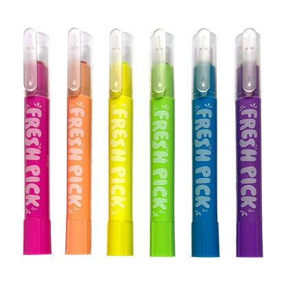 Row of capped crayons in rainbow order from the OOLY Fresh Pick Apple Scented Gel Crayons set