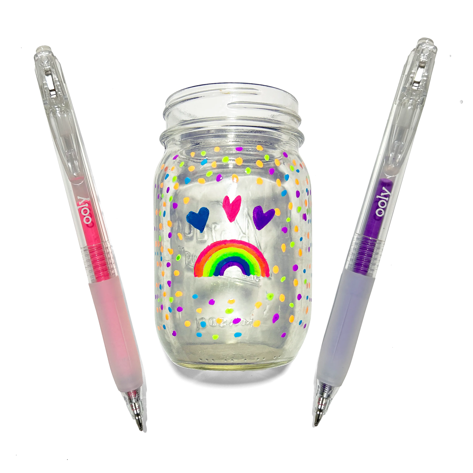 Colored pens and a jar colored with hearts and a rainbow made with OOLY Jelly Gloss Neon Multi-Surface Deco Gel Pens