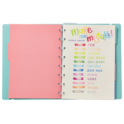Open planner with page reading "Make No Mistake" and color swatches from the OOLY Make No Mistake Erasable Markers