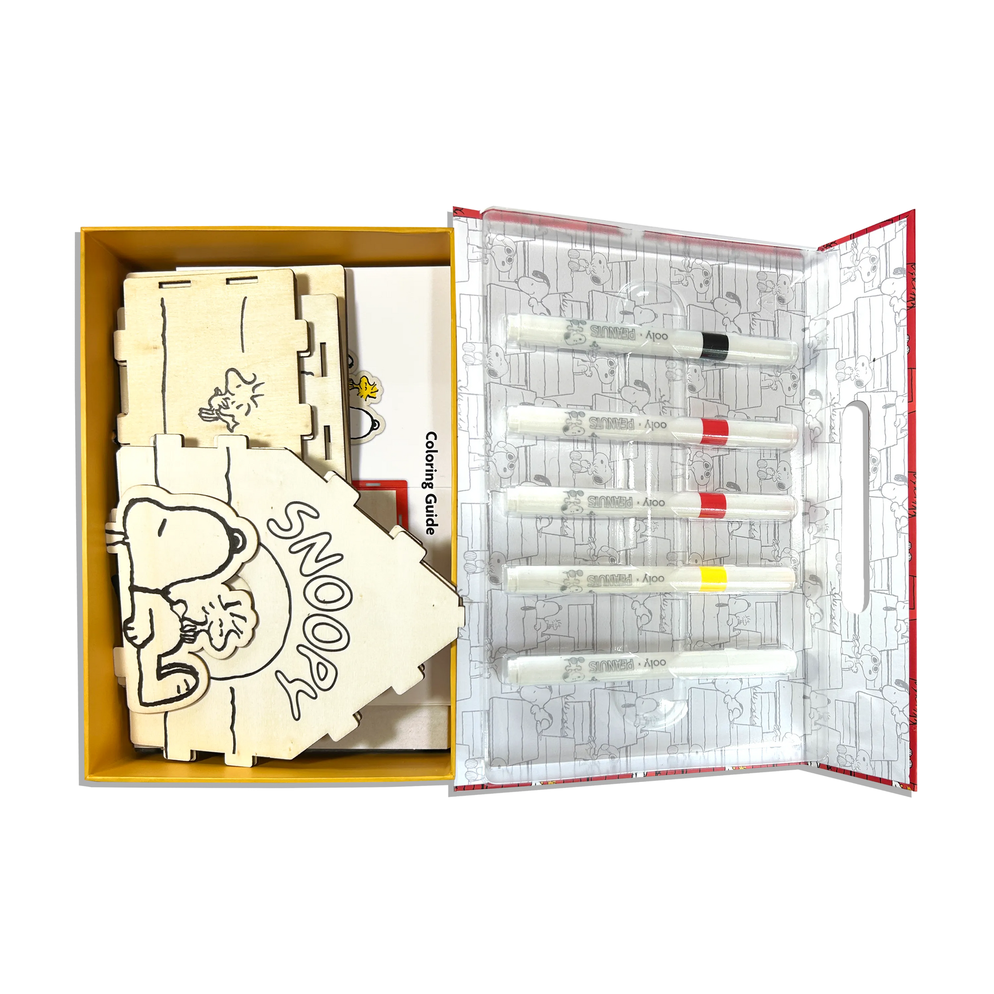 Open set showing markers and bridhouse from OOLY x Peanuts Color-in Wooden Birdhouse Kit
