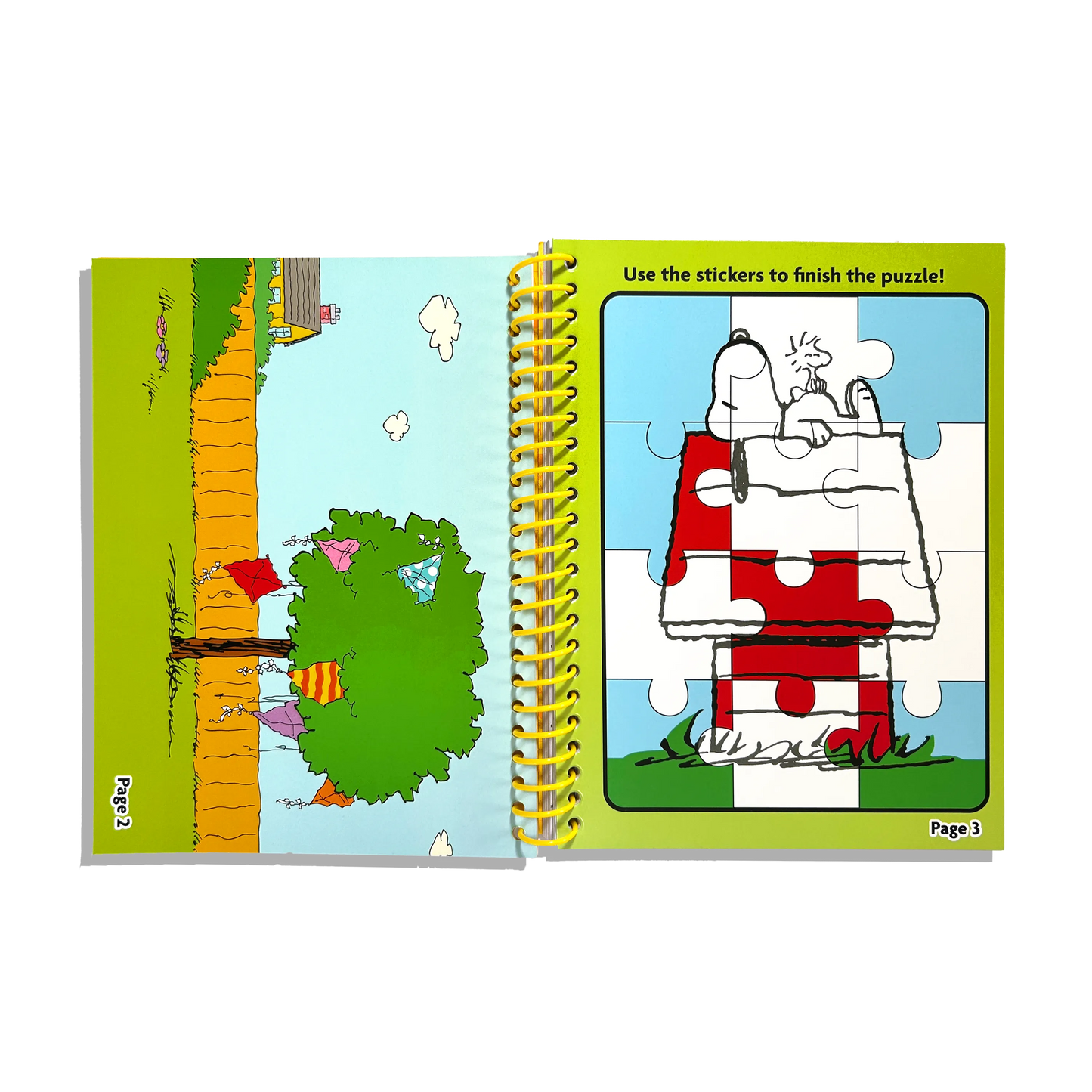 Open activity kit sowing sticker page and puzzle from the OOLY x Peanuts Coloring Activity & Sticker Kit