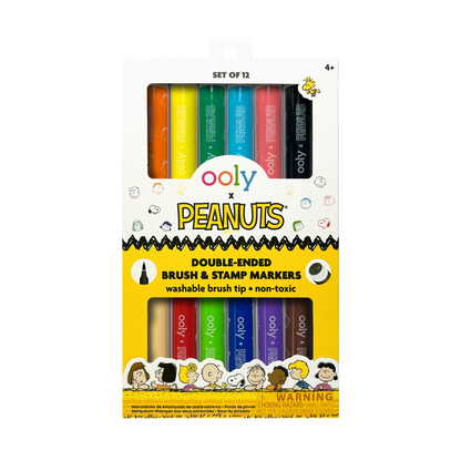 Front of packaging of the OOLY x Peanuts Double-Ended Brush & Stamp Markers