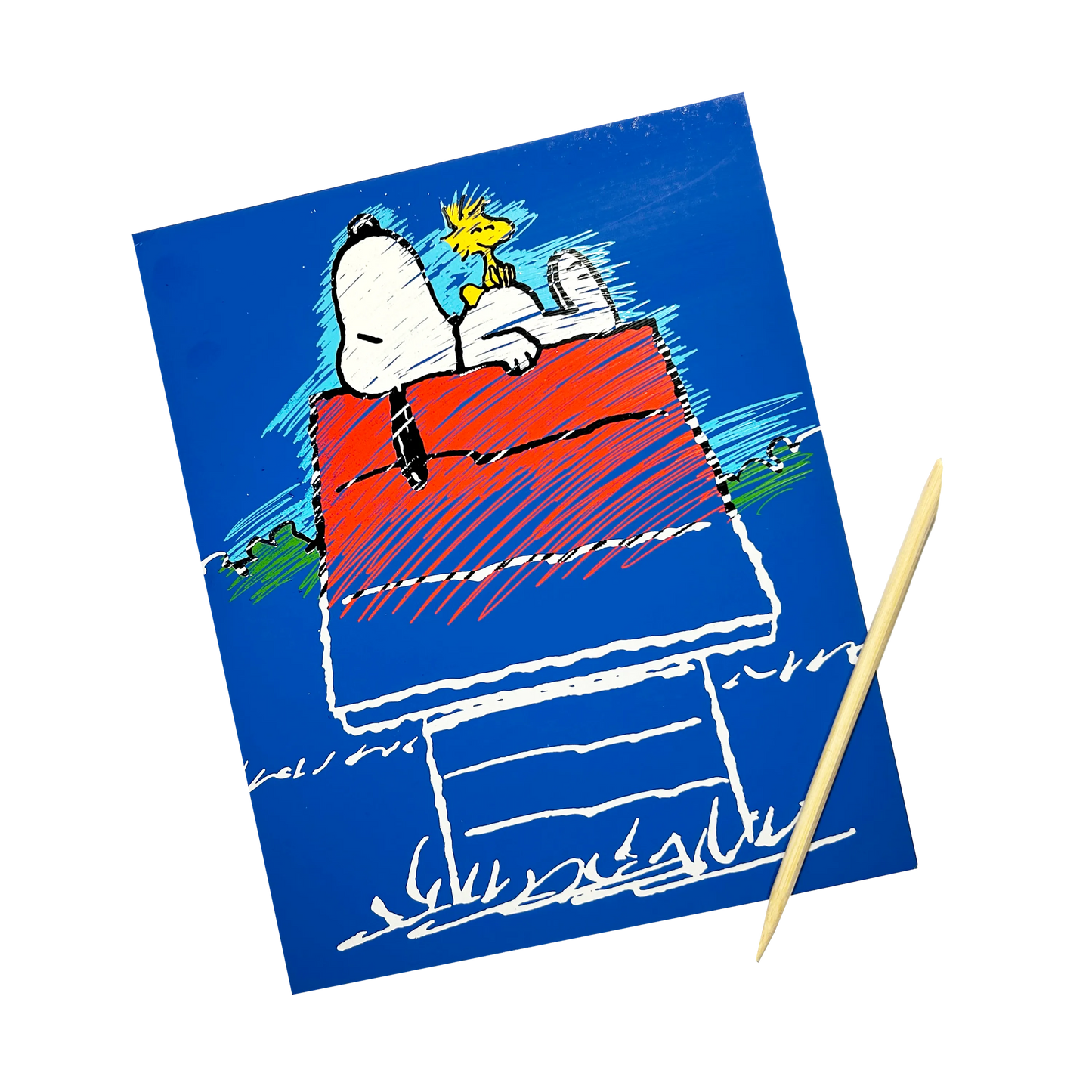 Partially scratched OOLY x Peanuts Scratch Art Kit showing Snoopy and Woodstock on Snoopy's doghouse