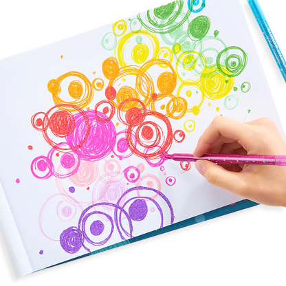 Person coloring rainbowed overlapping circles with OOLY Rainbow Sparkle Glitter Markers