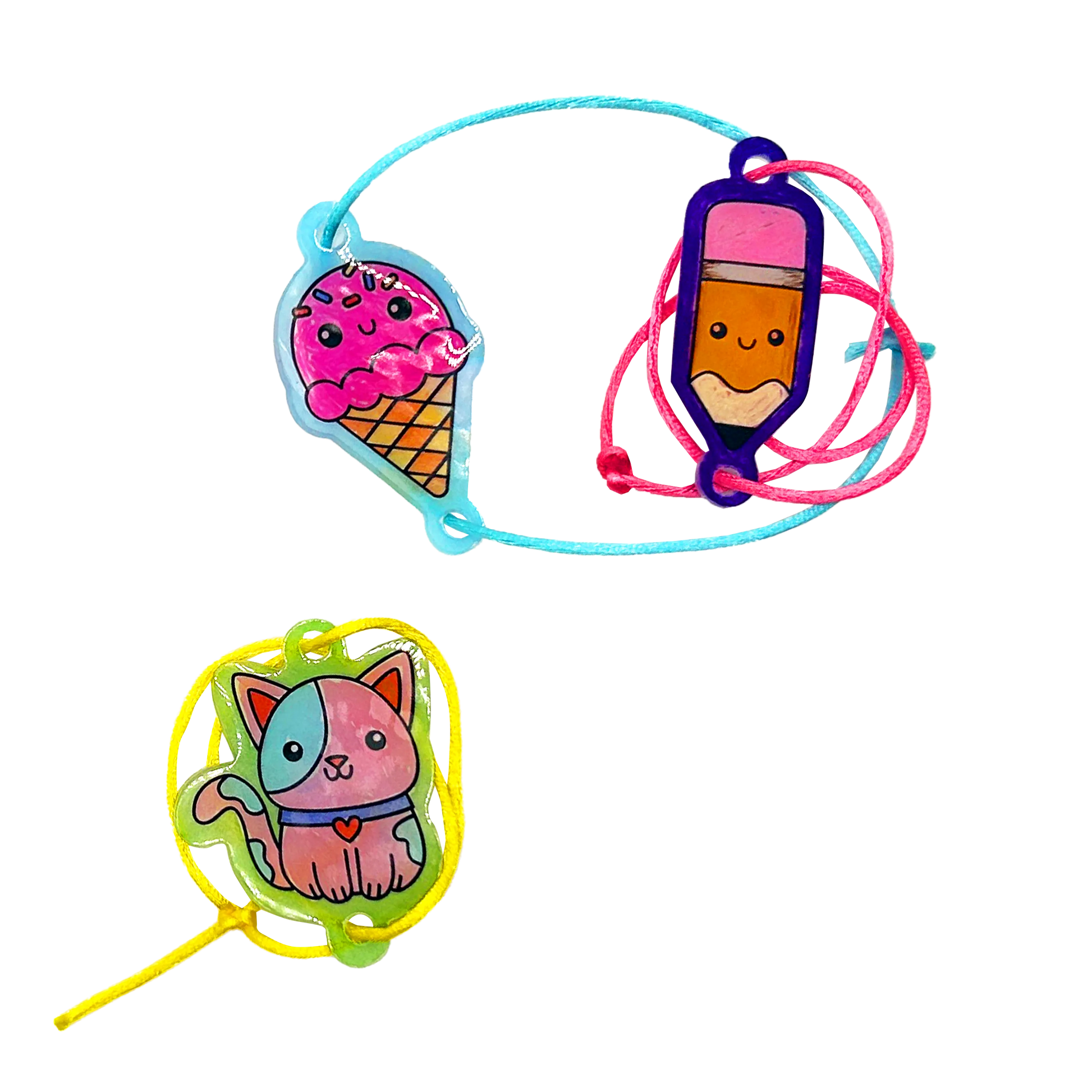 Finished ice cream, pencil and cat bracelets from OOLY Shrink-its! DIY Shrink Art Bracelet Kit - BFF