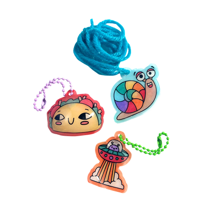 Finished charms of taco, snail and UFO from Shrink-its! DIY Shrink Art Kit - Fun Friends
