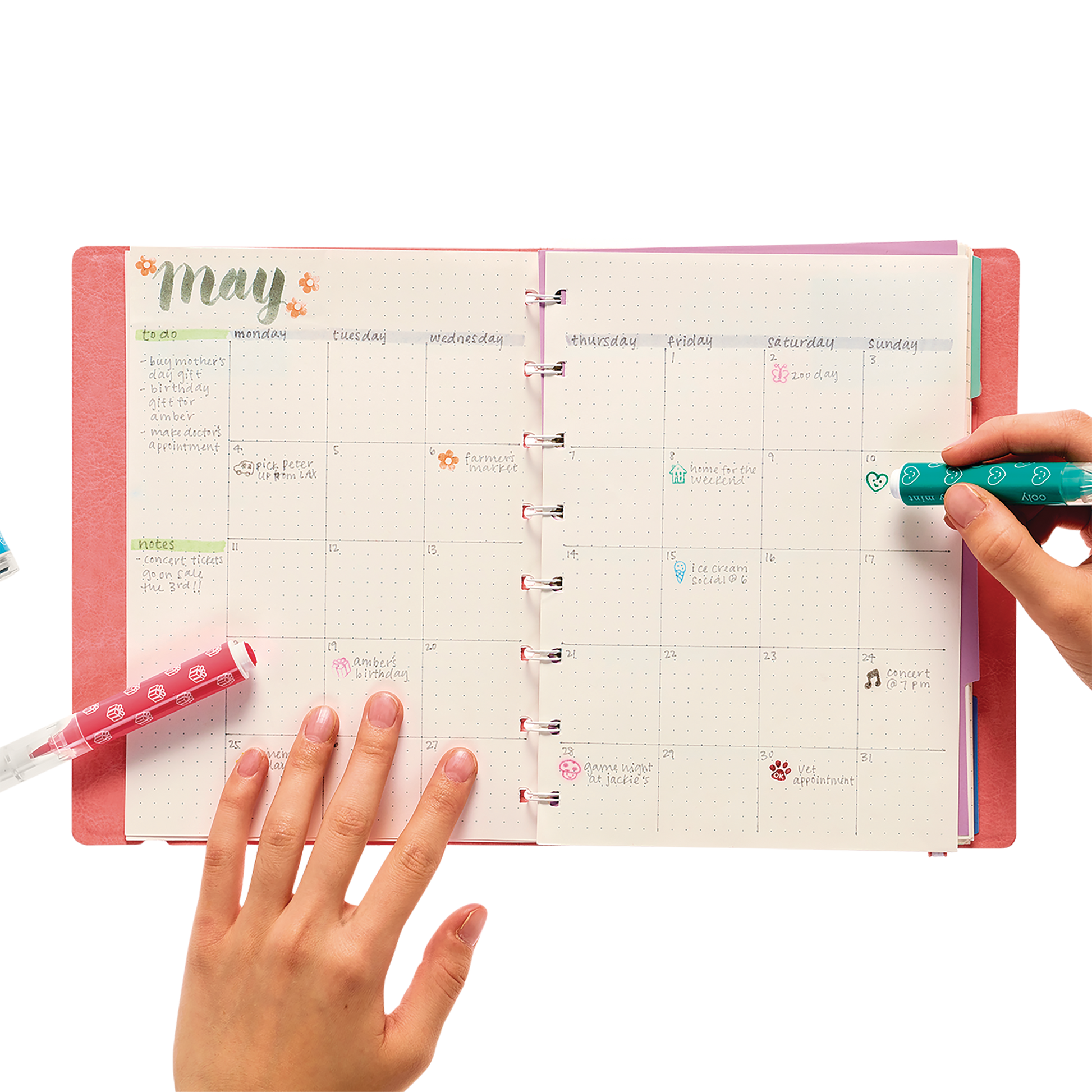 Placing colored stamps in a planner calendar with Stampables Double-Ended Stamp & Brush Markers
