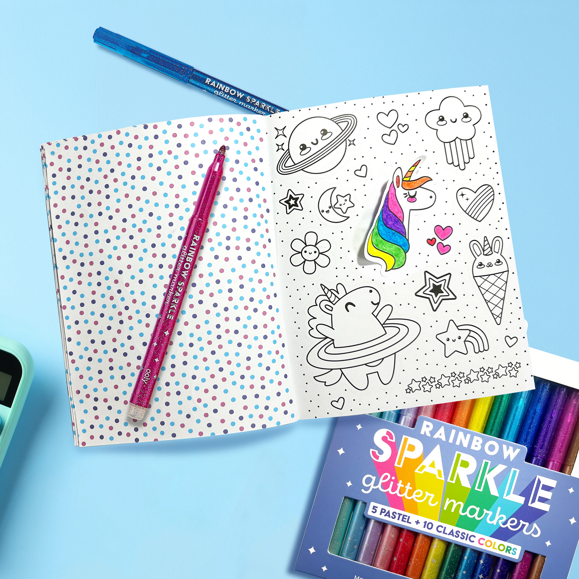 Opened Stickiville Color-In Sticker Book: Cute-A-Licious Doodles with colored unicorn sticker and Rainbow Sparkle markers