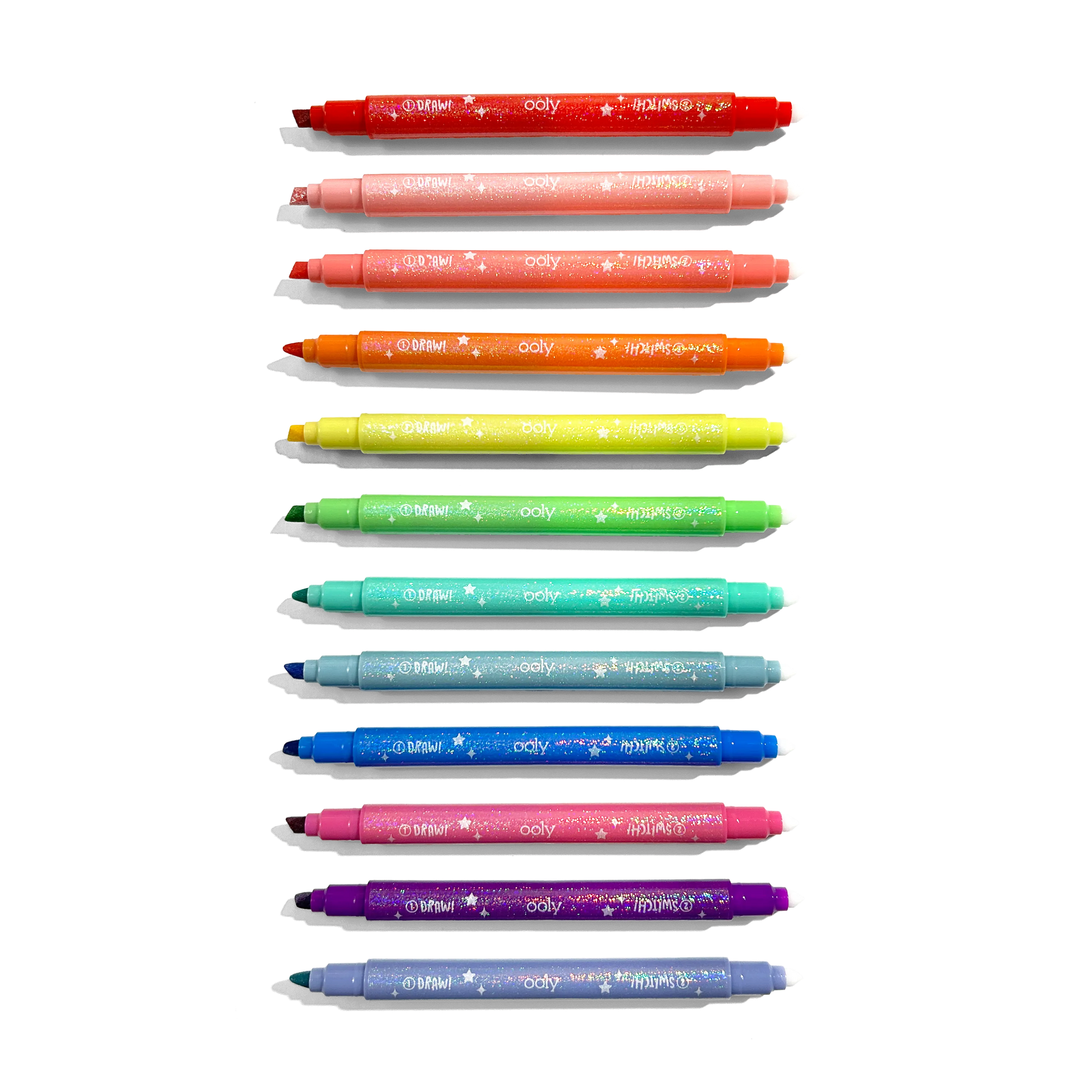Row of uncapped markers from OOLY Switch-Eroo Sparkle Glittery Color Changing Markers