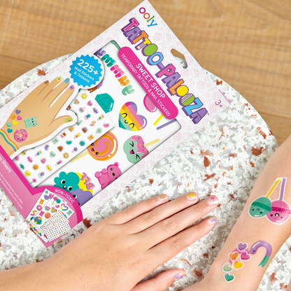 Close up of girls showing nail stickers and tattoos from OOLY Temporary Tattoo-Palooza Temporary Tattoos & Nail Stickers - Sweet Shop
