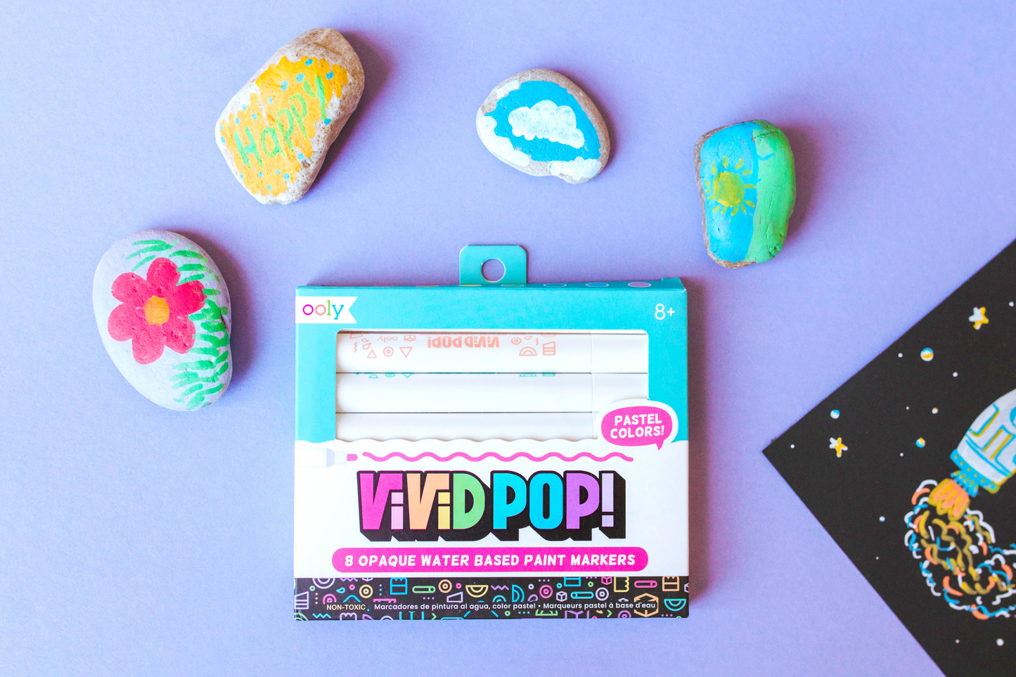 Girl-painting-rocks-with-OOLY-Vivid-Pop-Pastel-Paint-Markers