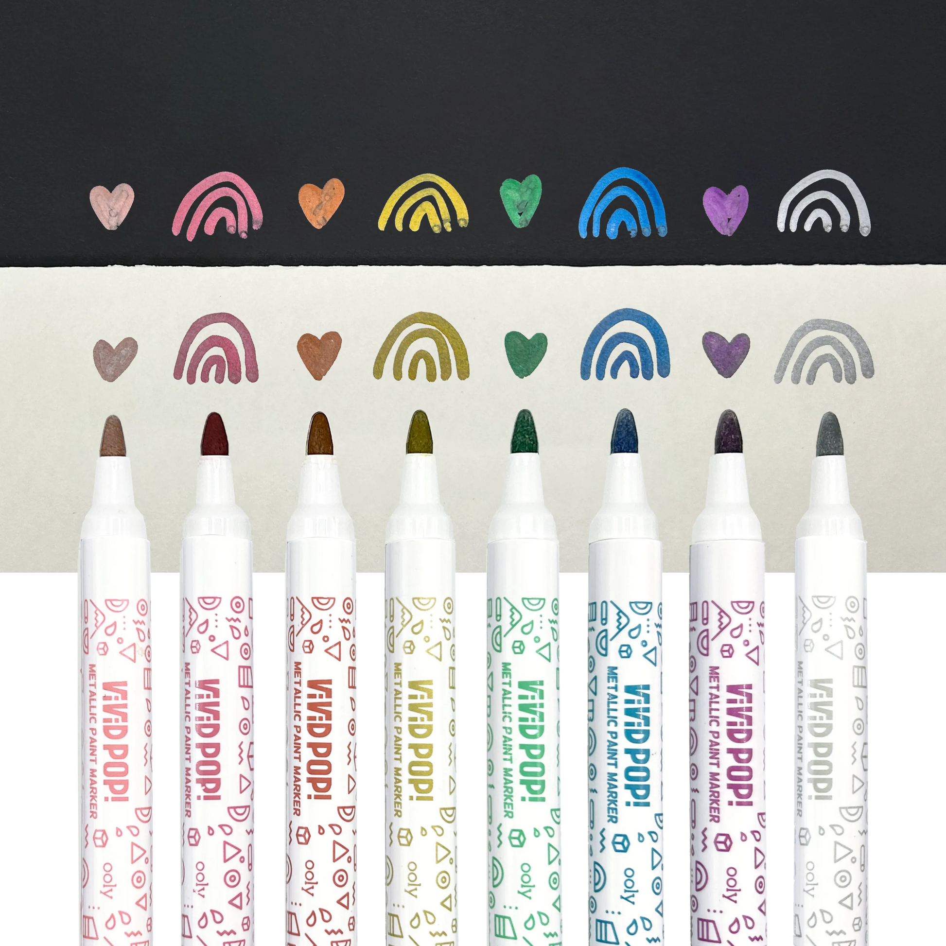Row of OOLY Metallic Vivid Pop! Water Based Paint Markers with swatches on white and black paper