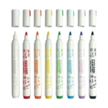Row of uncapped markers from OOLY Vivid Pop! Water Based Paint Markers - Set of 8